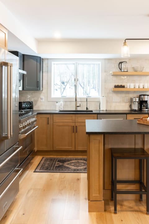 Fully stocked luxury kitchen with coffee maker, espresso machine, and all the essentials you'll need