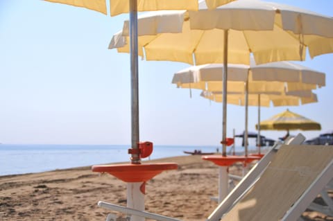 Private beach nearby, white sand, sun loungers, beach umbrellas