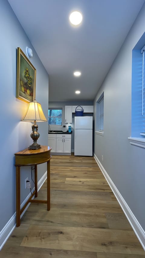 Admire the aesthetic charm of the lamp design along the way to the kitchen, adding a touch of elegance to your space!