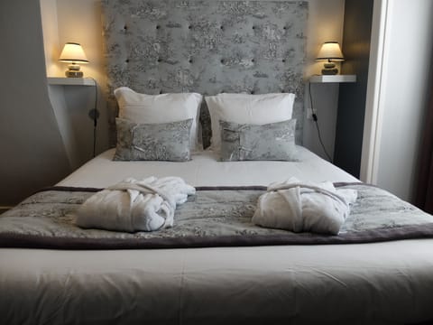 Premium bedding, blackout drapes, free WiFi, bed sheets