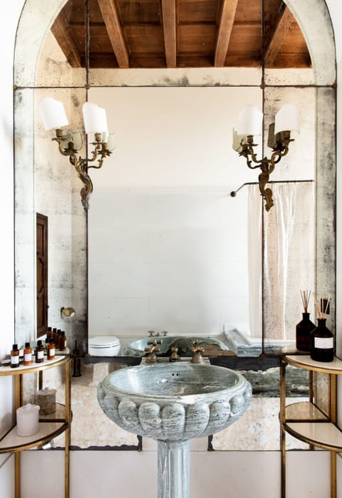 The Castello Suite | Bathroom | Designer toiletries, hair dryer, bathrobes, slippers