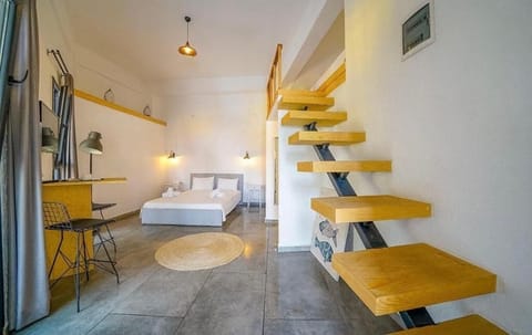 Deluxe Triple Room, City View | In-room safe, blackout drapes, soundproofing, iron/ironing board