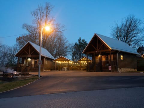 Campfire, grill, and nice lighting under private pavilion