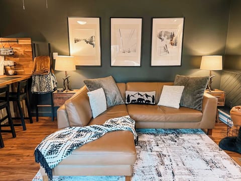 Comfortable leather chase sofa that provides plenty of room for extra sleeping.