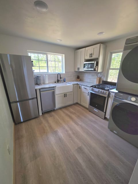 Small but mighty, this kitchen has smart storage with all the essentials.