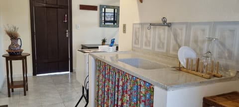 Basic Apartment | Bathroom | Separate tub and shower, towels, soap, shampoo