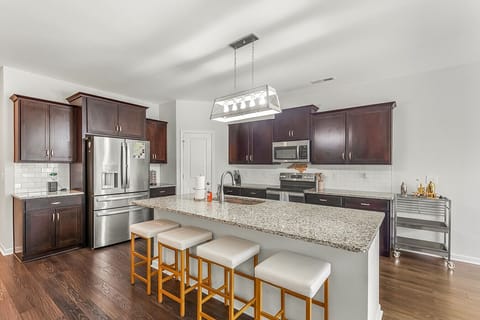 Spacious kitchen with breakfast bar seating