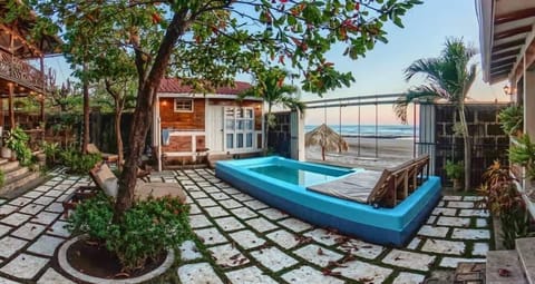 Casita 3 - Pool - Private Bath - KitchenThis is Casita 3.  Sleeps 2 - Amazing place for couples with a bed overlooking the beach.  Has TV with Netflix and A/C included   