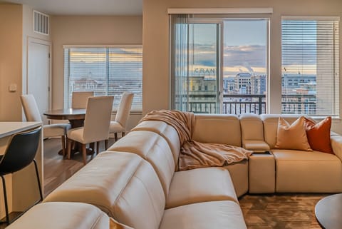Beautiful living room with luxury leather sectional, 75` roku tv set and lovely views!