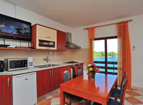 Apartment (One Bedroom Apartment with Balcony an) | Private kitchen | Fridge