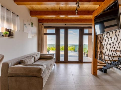 Villa (Four Bedroom Villa with Pool, Hot-Tub) | Living room | 32-inch flat-screen TV with digital channels, table tennis