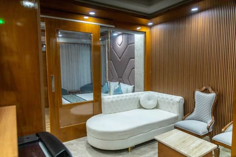 Deluxe Apartment | Living area | 32-inch LCD TV with digital channels