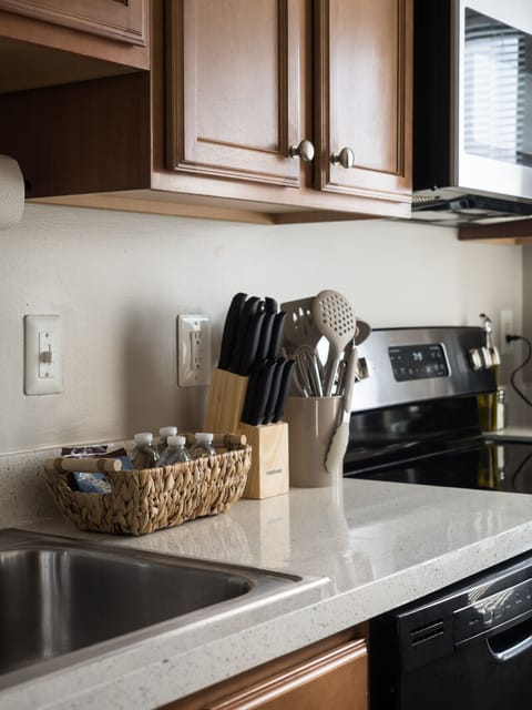 Enjoy cooking in this modern kitchen, complete with everything from cookware to a coffee maker, so you can feel right at home.