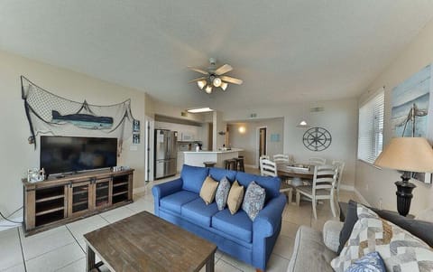 Open concept living area with sleeper sofa and gulf views