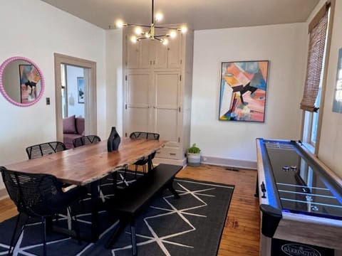 Shuffleboard & Dining Area stocked with games and puzzles