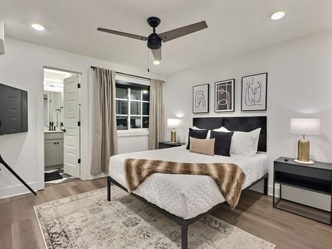 Bright and elegant bedroom designed for comfort and relaxation in this furnished apartment.