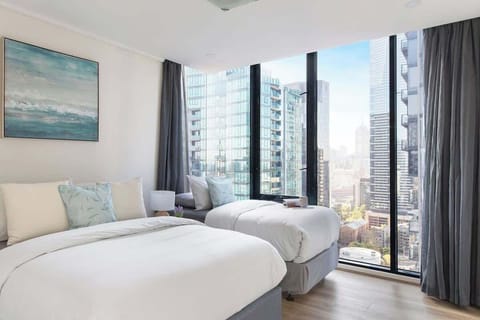 The master bedroom with a double & a single sized bed.