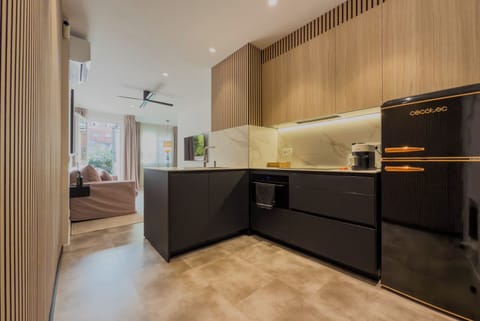 Family Apartment, Courtyard View, Garden Area | Private kitchen | Full-size fridge, microwave, oven, stovetop