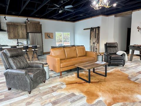 Propane fireplace in the living room w/ a smart tv.