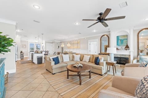 Coastal living room designed for comfort, perfect for group gatherings