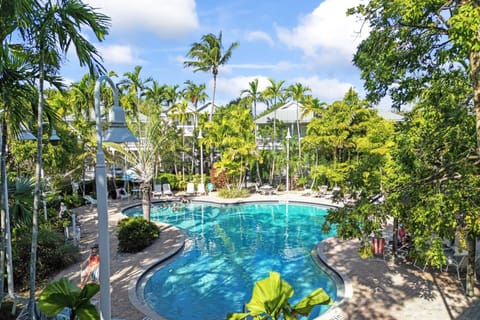 The shared heated pool offers a relaxing oasis with warm waters and a serene atmosphere perfect for unwinding after a day of exploring Key West.