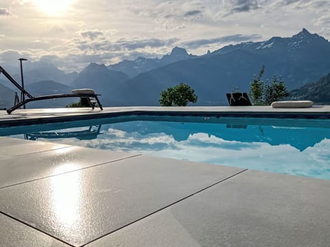 Swimming Pool, Composite Material, Mountain Range, Ridge, Outdoor Furniture, Alps, Shade, Sunlounger, Resort, Eco Hotel