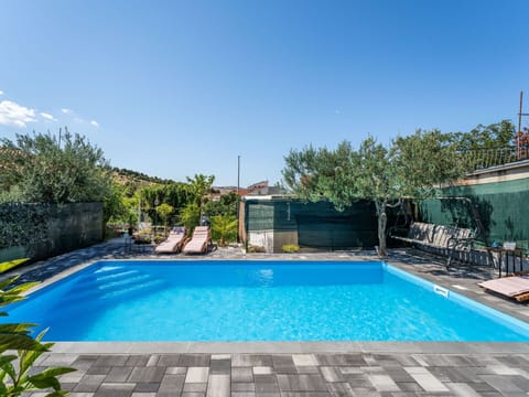 Blue, Swimming Pool, Outdoor Furniture, Resort, Composite Material, Eco Hotel, Shade, Leisure, Water Feature, Chair