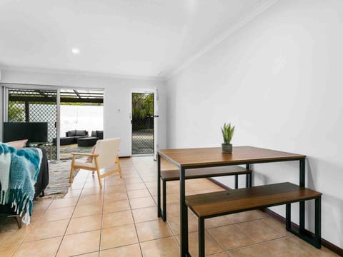 Seamlessly transition from dining indoors to relaxing al fresco in your private outdoor space.