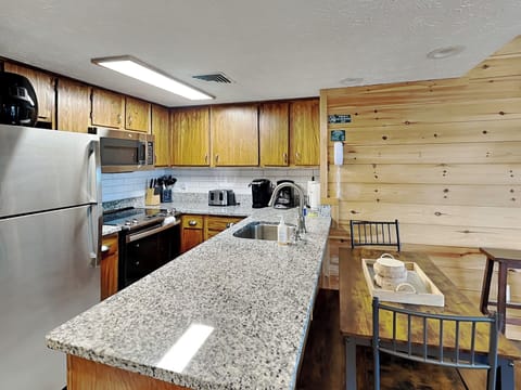 Fully Equipped Kitchen with Stainless Steel Appliances