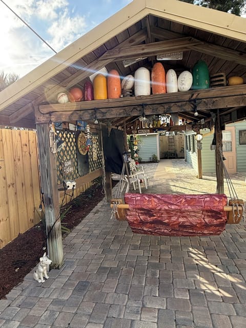 Huge tiki with darts, television and tiki lights.  Great for entertaining