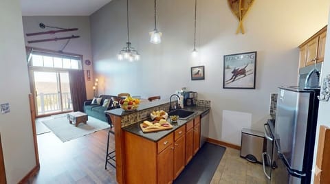 Enjoy meals together with ski-inspired décor and rustic wood finishes.