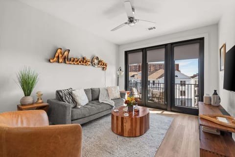 Cozy living room, and access to a private balcony