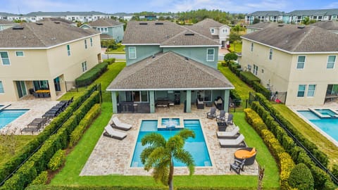 Spacious backyard with a private pool and patio.