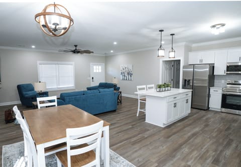 Open-concept living, dining, and kitchen perfect for gathering