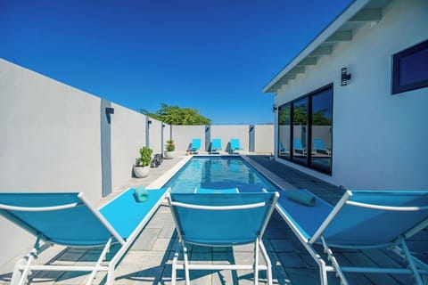 Escape to your very own oasis in this stunning property, featuring a magnificent private swimming pool! Imagine endless days of sun, relaxation, and unforgettable moments right in your backyard.