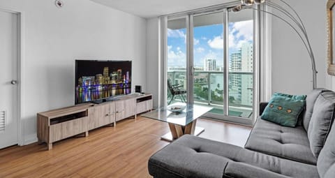 Beach Getaway: Modern 2BR Condo Pool & Gym Access (9922)