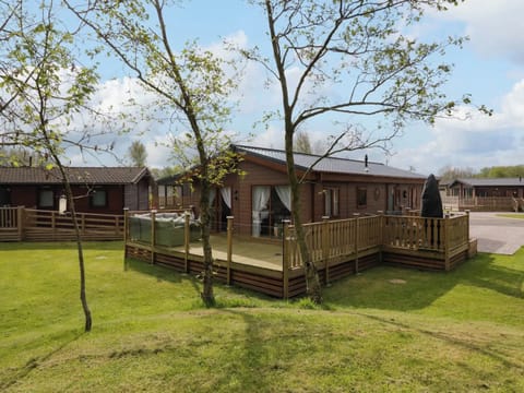 Lodge Front With Large Front And Side Decking