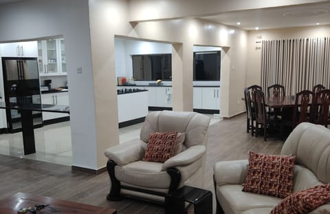 Deluxe Double Room, Patio, Garden View | Living area