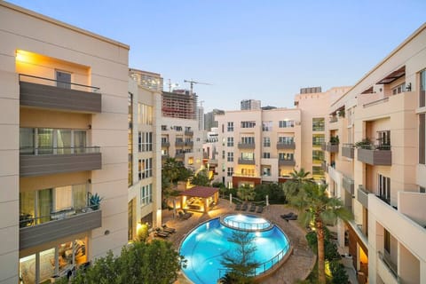 Pool Paradise: Dive into chic outdoor living with a stunning pool and vibrant garden views!