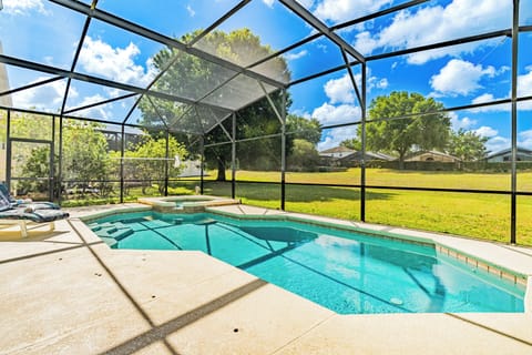 Relax in your own private screened-in pool and spa.