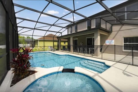 An outdoor pool and hot spa is the perfect combination of relaxation and luxury, creating a resort-like atmosphere in your own backyard.