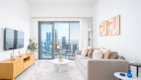 A sleek living room featuring clean lines, modern furniture, and a neutral color palette.