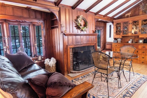 Cozy up to the wood fireplace in this enchanted cottage.