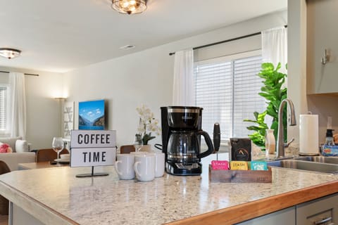 12-cup drip coffee maker, ground coffee, tea and milk frother provided