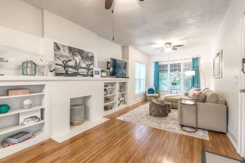 ✨ Bright, stylish living area with historic charm — your Tulsa home base.