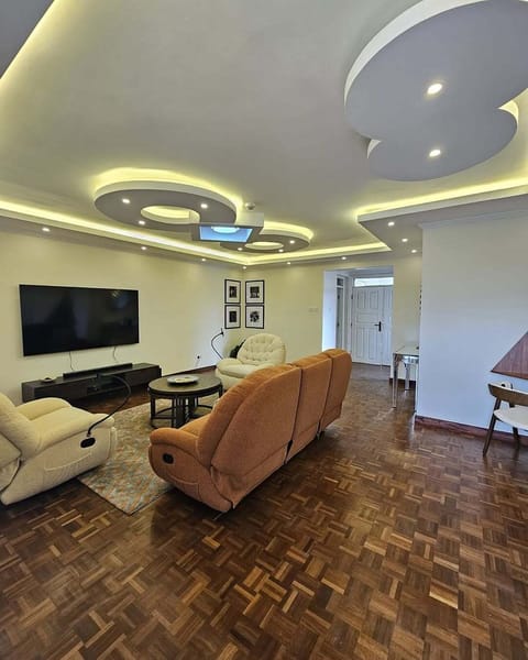 Apartment, City View | Living area | Computer monitors