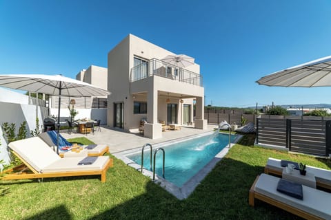 KS Omega Villa - outdoor space with swimming pool, sun beds and BBQ facilities
