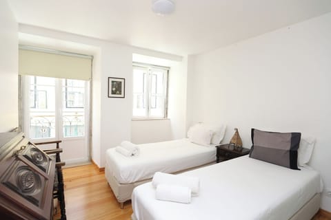Bedroom with blackout shades
2 single beds: 90x200cm each (may be arranged as a double bed)