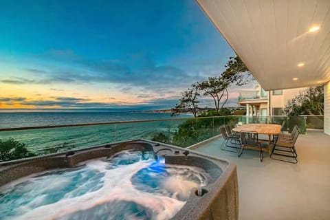 Revel in the endless views while soaking in the hot tub or enjoying an alfresco meal among the sunset