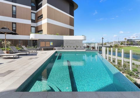 Complex Pool, Sun Lounges and Umbrella 